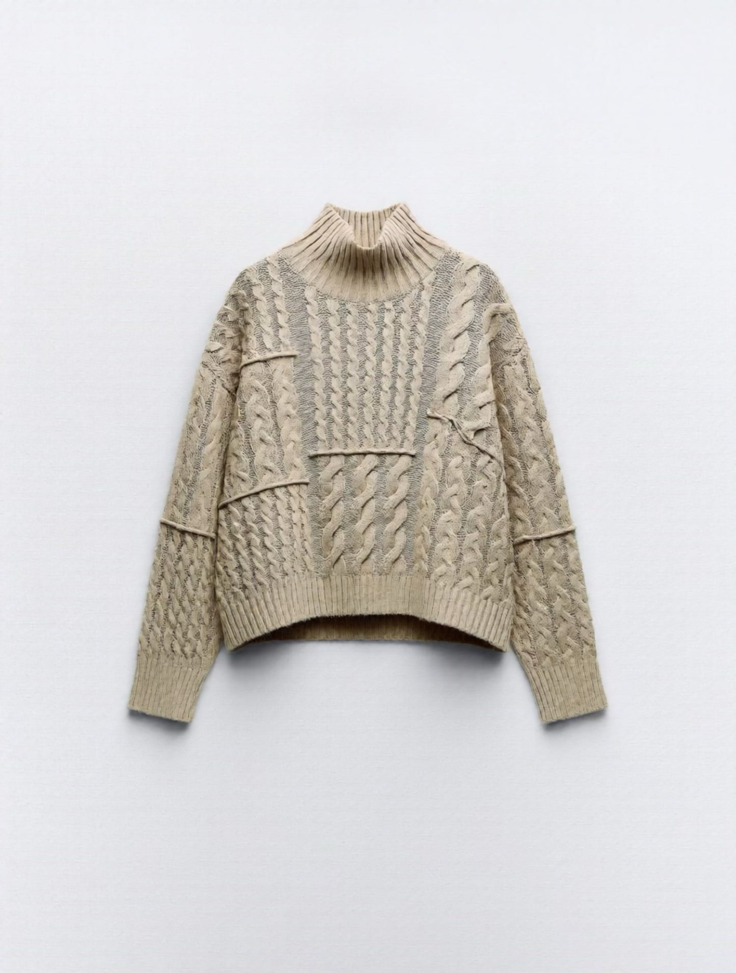 Maglione dolcevita trecce