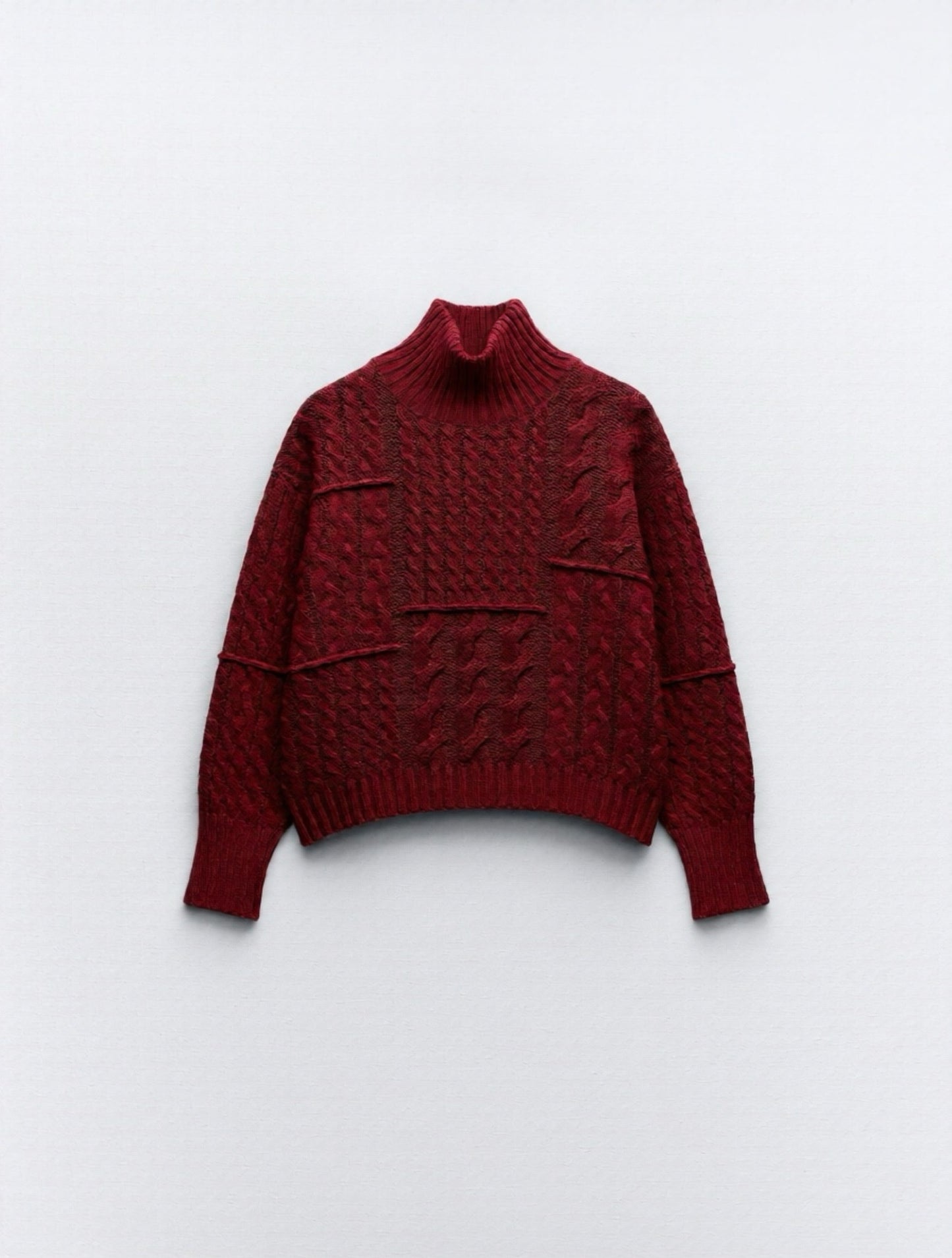 Maglione dolcevita trecce