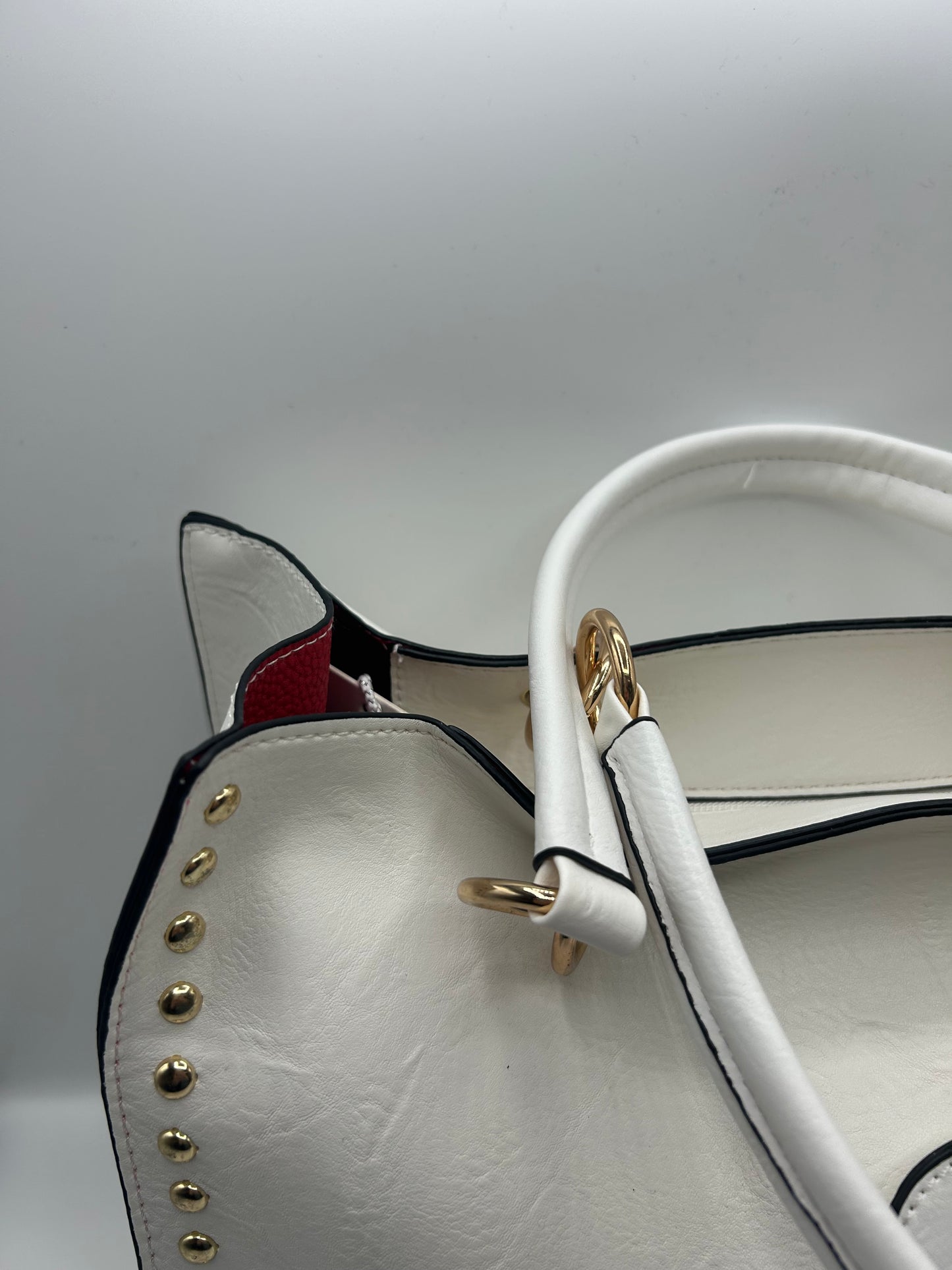 Borsa borchie oro e porta monete