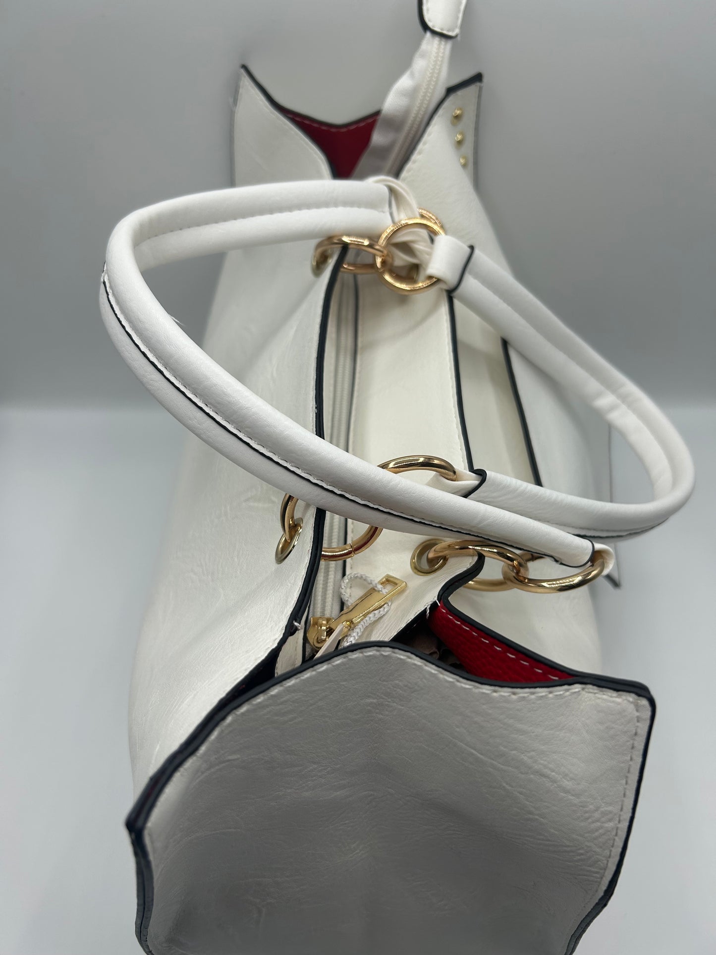 Borsa borchie oro e porta monete