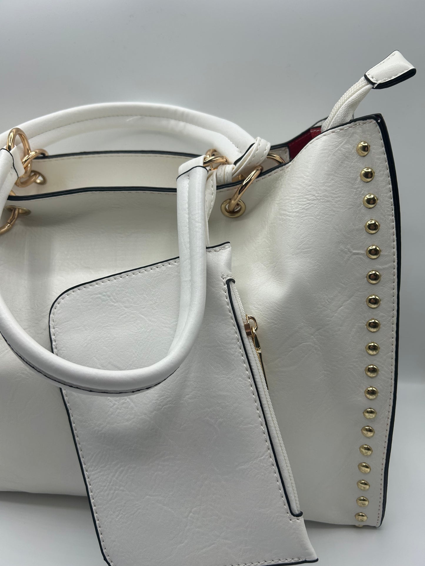 Borsa borchie oro e porta monete